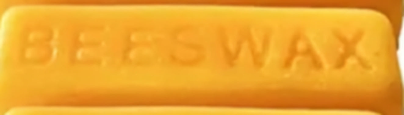 Picture of 1 ounce beeswax. Yellow.