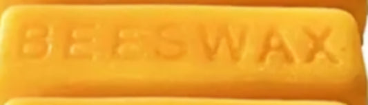 Picture of 1 ounce beeswax.  Yellow. 